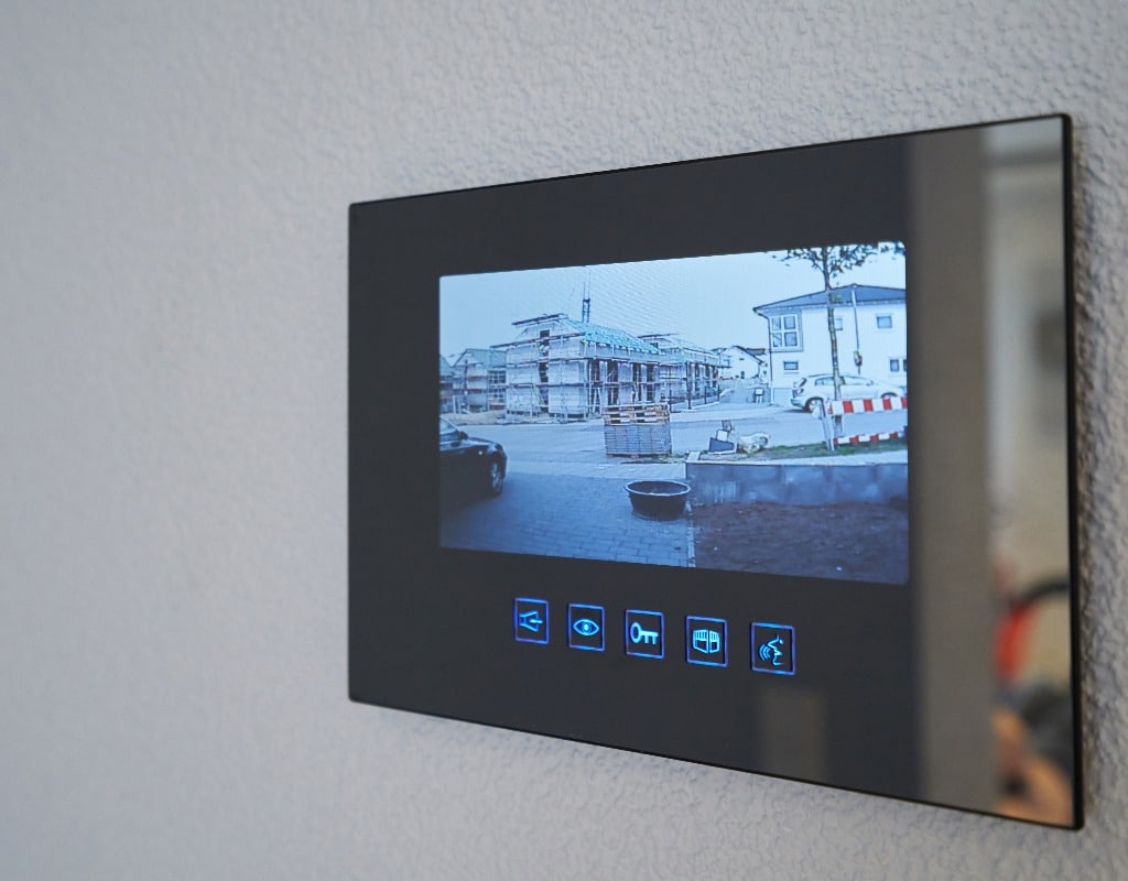 Intercom with video image mounted on the wall in the house. Close-up